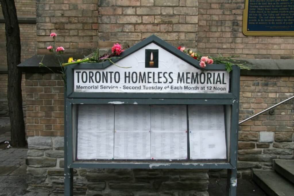 Homeless Memorial sign with Flowers