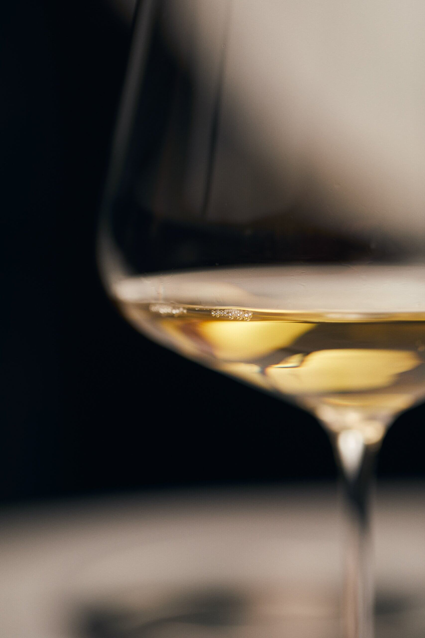 tight close up of a wine glass